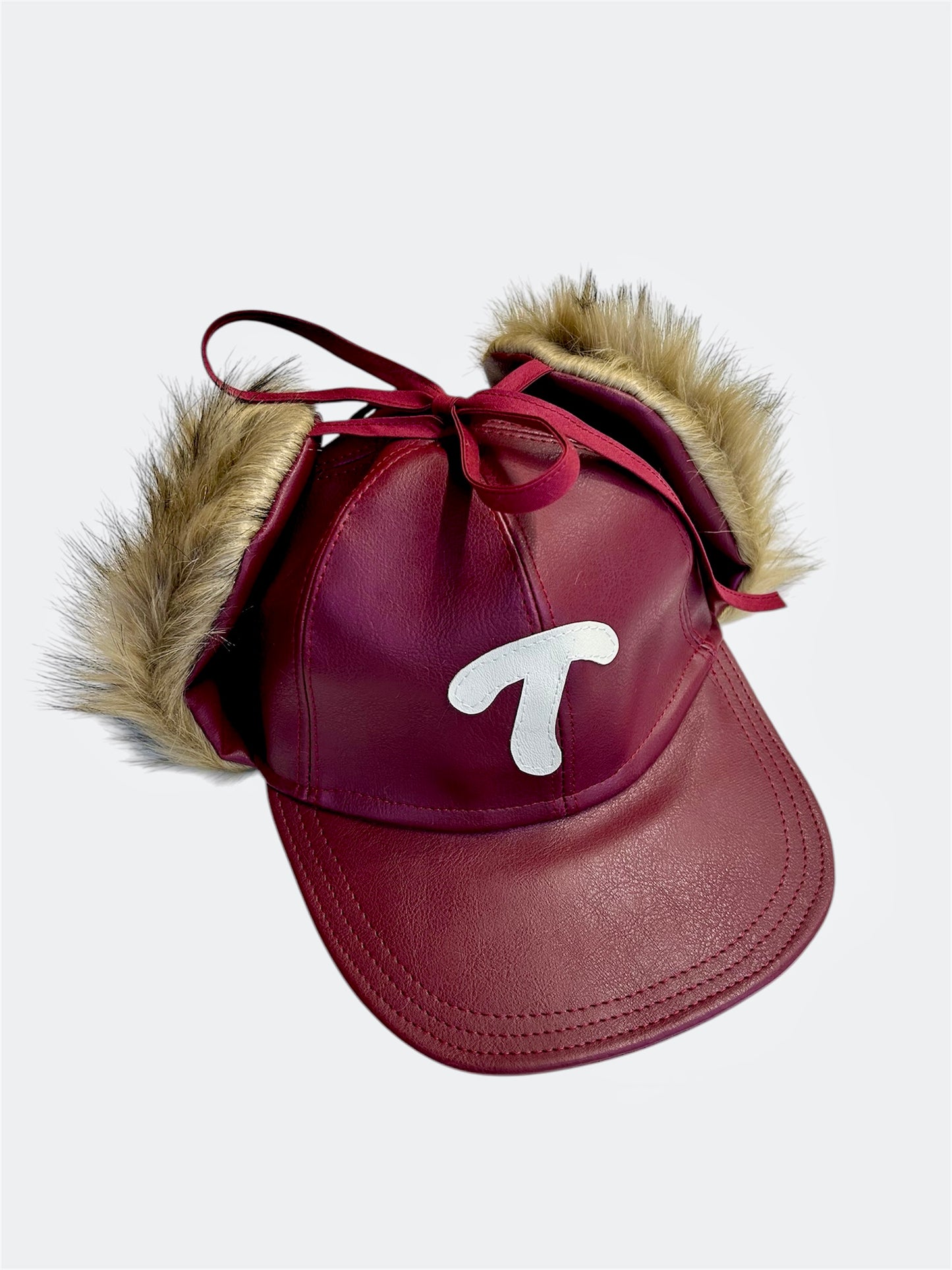 Fluffy (f)leather flap cap